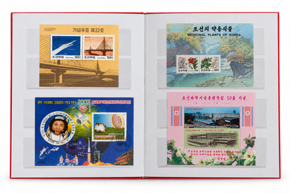 Collection of original North Korean stamps with effigies of Kim Jong-Il, Kim Il-Sung